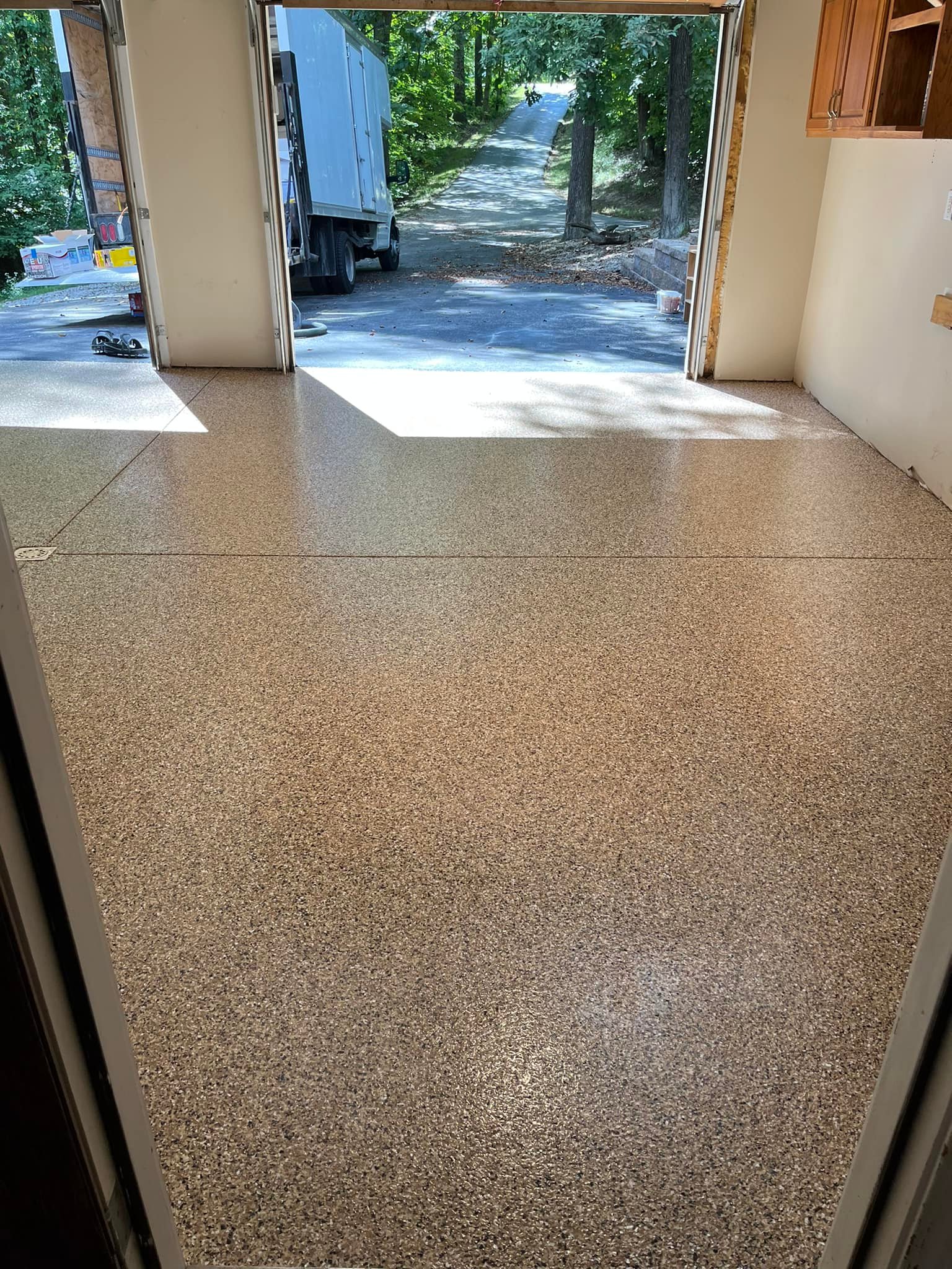 Epoxy flake garage floor system by Infinity Custom Flooring