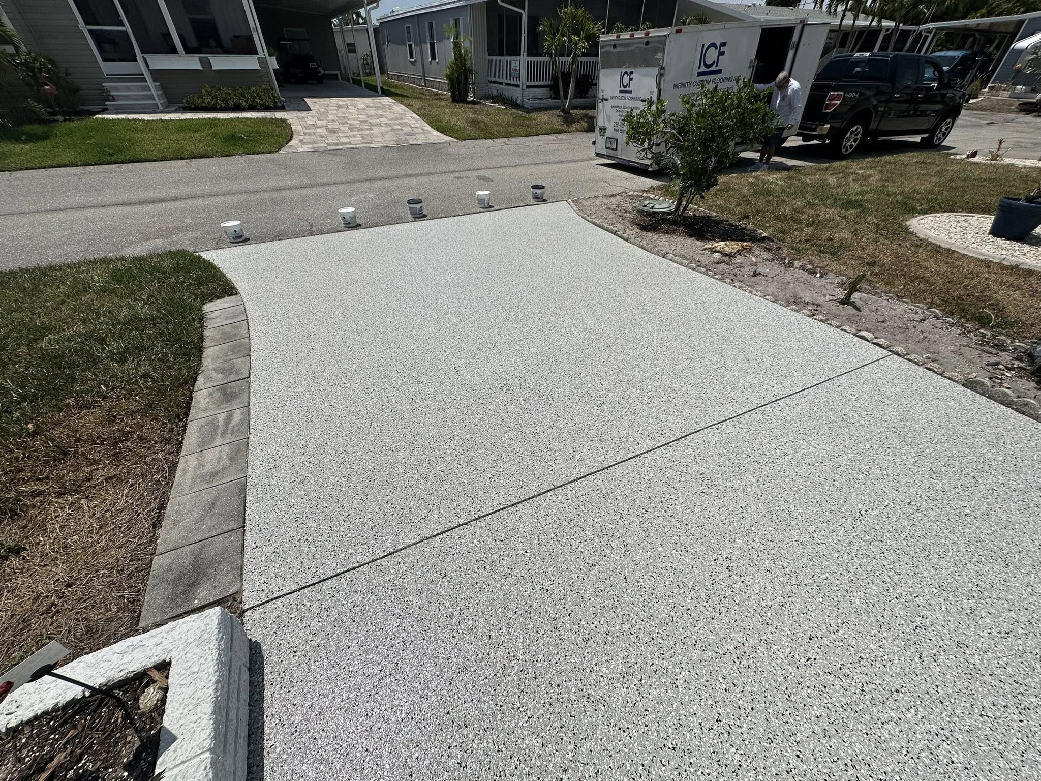 Coated driveway by Infinity Custom Flooring