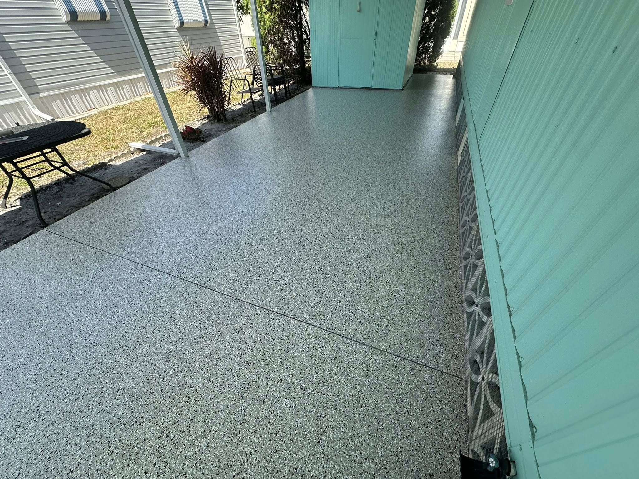 Covered patio flake coating by ICF