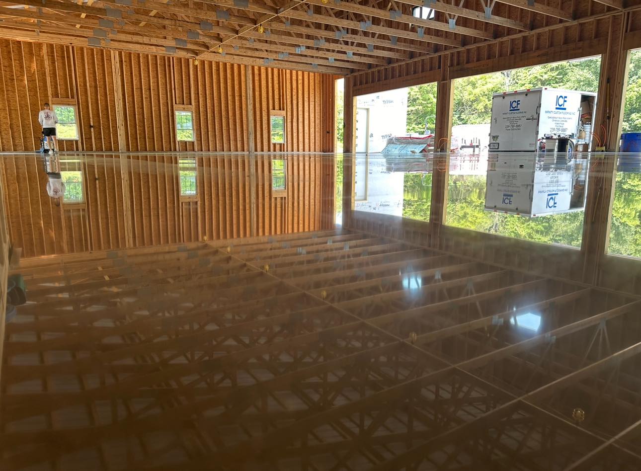 High-gloss metallic epoxy floor by Infinity Custom Flooring